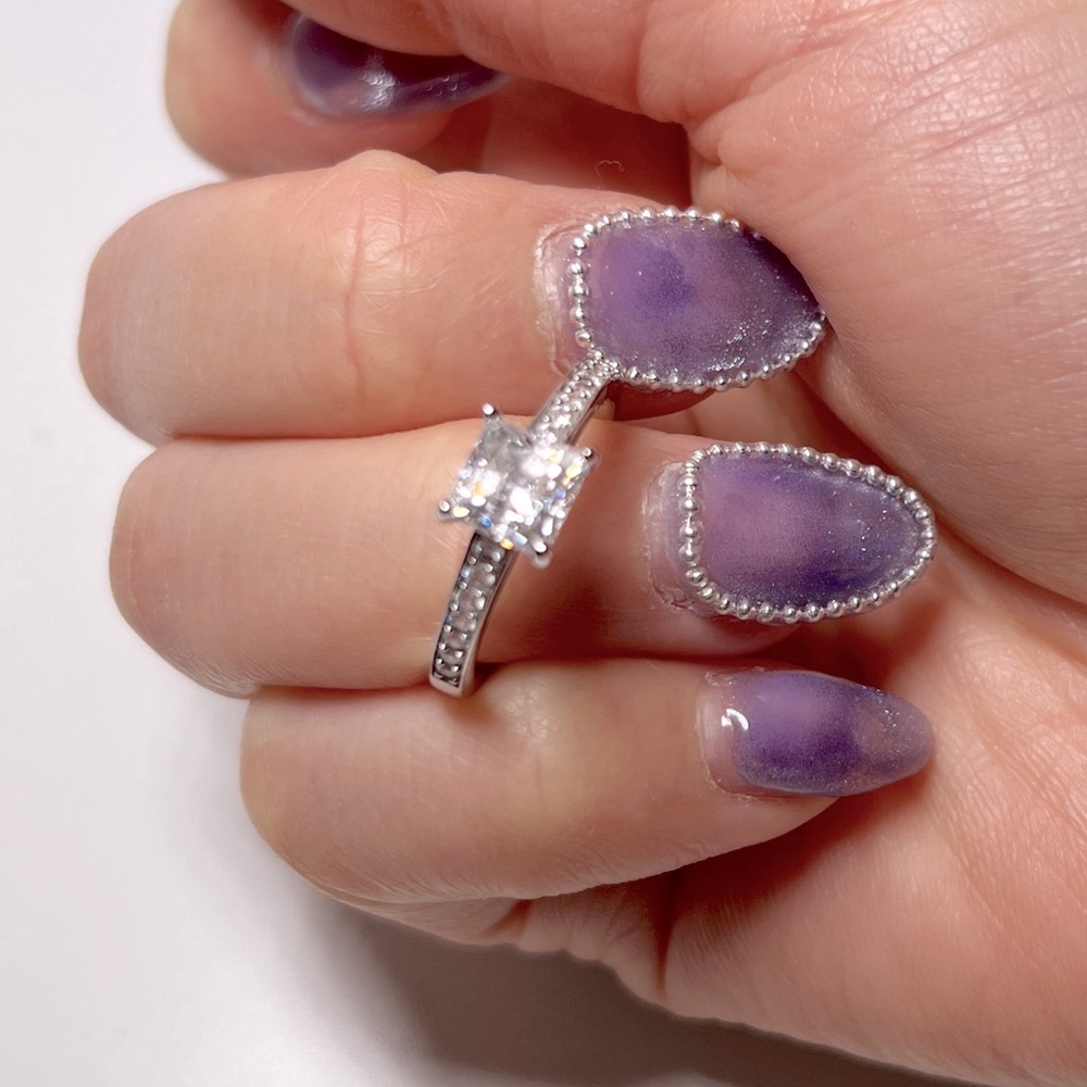 Swarovski .75CT solitaire ring with accent crystals